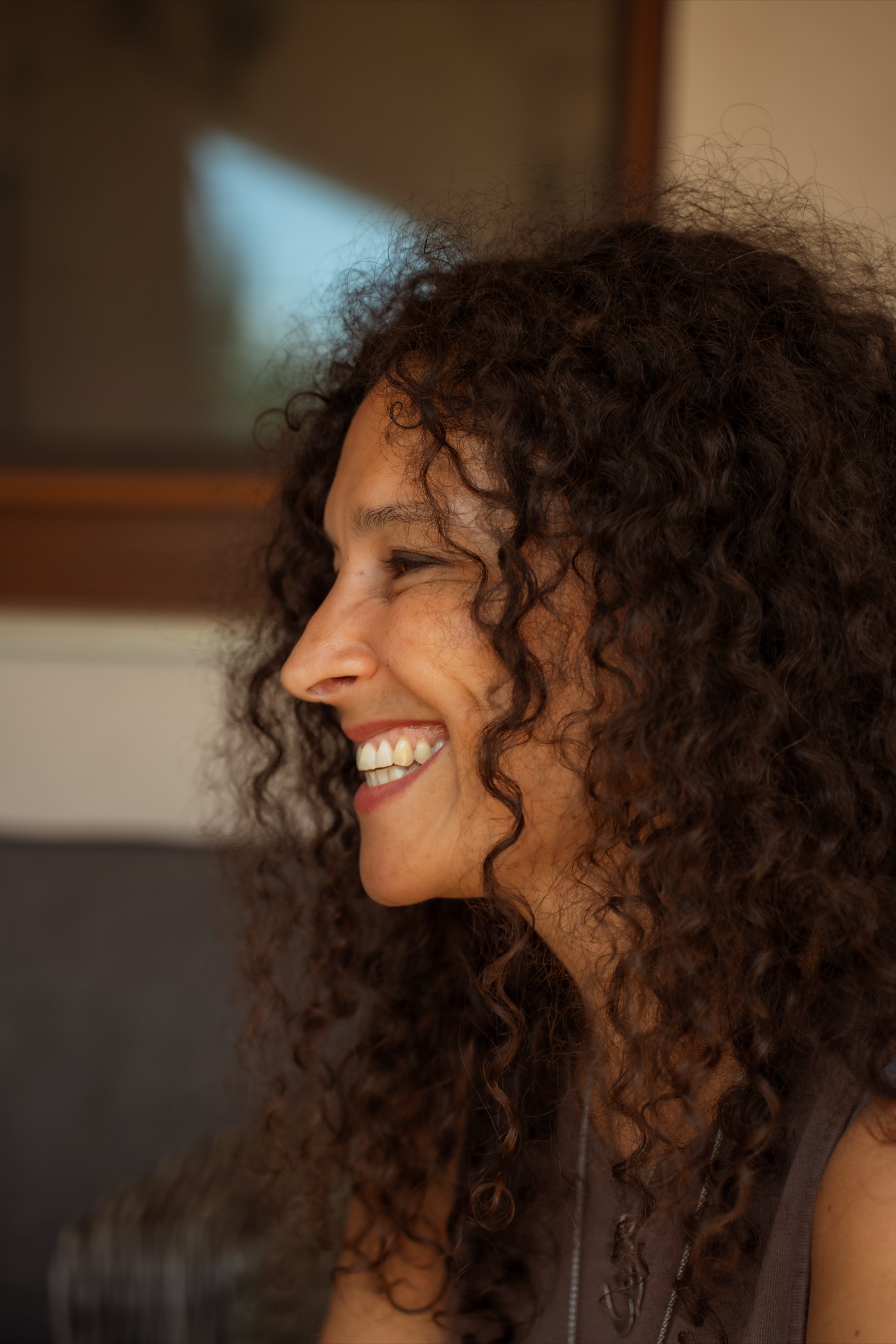 Andrea Varadi Goia smiling in profile during the workshop