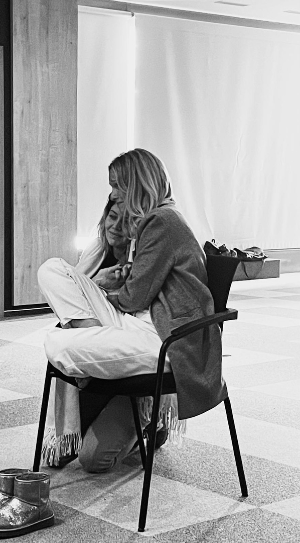 A participant sitting alone in a quiet moment of reflection